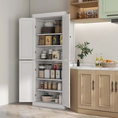 an open cabinet in the middle of a kitchen