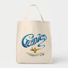 Aladdin Genie... Itty-Bitty Living Space Tote Bag Color: Natural. Gender: unisex. Age Group: adult. Pattern: graphic. Aladdin Genie, Disney Live Action Movies, Kids Tote Bag, Genie Aladdin, Grocery Tote, Disney Aladdin, Typography Graphic, Foil Cards, Itty Bitty