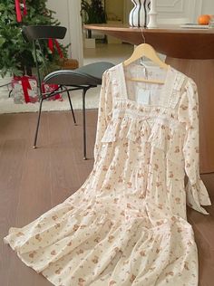 This cotton nightdress boasts a charming flower bear print that's both whimsical and comfortable. Made with 100% cotton, it offers a soft and breathable fit for a restful night's sleep. Embrace a touch of fun and relaxation with this delightful nightdress. Shoulder 37cm, Chest 47cm, Sleeve 55cm, Length 110cm (Fits XS-M) Cotton 100% Machine Wash Delicate cycle with like colors Casual Long Sleeve Nightgown With Floral Print, Casual Long Sleeve Floral Print Nightgown, Floral Print Long Sleeve Nightgown For Loungewear, White Floral Print Long Sleeve Nightgown, Floral Print Long Sleeve Nightgown For Sleepovers, Long Sleeve Floral Print Nightgown For Sleepovers, Cute Floral Print Sleepwear For Pajama Party, Cute Ruffled Sleepwear For Sleepover, Cute Ruffled Sleepwear For Bedtime