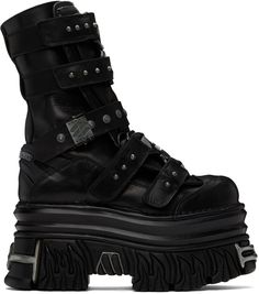 Find VETEMENTS New Rock Edition Gamer Boots on Editorialist. Mid-calf buffed and grained leather boots in black. · Pyramid studs and graphic rivets throughout · Graphic hardware at toe and heel · Graphic logo plaques at vamp · Velcro closure · Cinch strap at vamp · Padded layered tongue · Rubberized pull-tab at heel counter · Grained leather lining · Molded rubber footbed · Graphic platform rubber midsole · Treaded rubber sole · Logo-engraved antiqued silver-tone hardware · Platform: H3.5 Part of the VETEMENTS X New Rock collaboration. Supplier color: Black Vetements Shoes, Casual Shoes Women Sneakers, Shoes Women Sneakers, Black Pyramid, Goth Shoes, Goth Boots, New Rock, A Beast, Women Sneakers