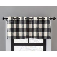 a black and white checkered window valance