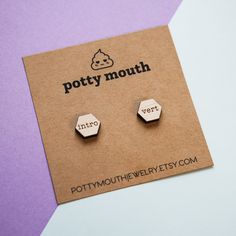 "THE DEADLINE FOR DELIVERY BY CHRISTMAS WAS DEC 9 - ORDERS PLACED AFTER DEC 9 ARE NOT GUARANTEED TO/WILL LIKELY NOT MAKE IT BY CHRISTMAS. POTTY MOUTH CREW SIGNUP: Join our mailing list for 10% off your next purchase: https://mailchi.mp/6ee1bcb918f9/pottymouth  (welcome email may take a couple minutes; be sure to check all folders/promotions tab/spam after signing up if you can't find your email confirmation) \"intro\" and \"vert\" engraved hexagon wooden studs, packaged ready for gifting. Made w Mouth Jewelry, Minimal Stud Earrings, Minimal Earrings Studs, Wood Earrings Stud, Potty Mouth, Wood Earring, Holiday Gift Card, Butterfly Clutch, Wood Studs