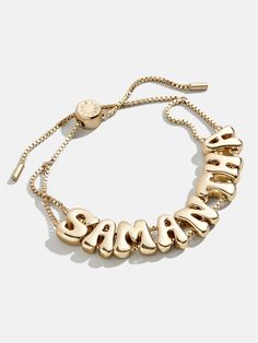 For those who love gold, our Bubble Custom Slider Bracelet is the custom bracelet pick for you. Two strands of box chain sit beneath letter beads of your choice and is topped off with an easily adjustable pull-tie closure. Even better? Each bead is crafted in a chic gold hue in a trendy bubble letter font, giving each letter extra dimension. Choose a name, initials, or favorite phrase to customize your bracelet with - it's sure to be your new everyday staple. See our Letter Key for all options a Baublebar Bracelet, Bubble Letter Fonts, Dope Jewelry Accessories, Shopping Wishlist, Bubble Letter, Slider Bracelet, Hello Kitty Accessories, Early Black Friday, Custom Bracelet