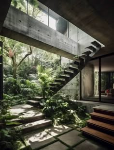 the stairs lead up to the upper level of this modern house in the jungle area