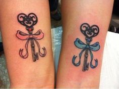 two tattoos on the arms of girls with hearts and keys attached to their wrists