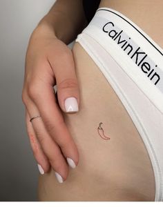 a woman's stomach with the word cawnkin written on it