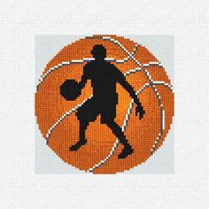 an orange basketball with a black silhouette on it