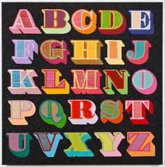 the alphabet is made up of different colored paper strips and letters that are cut into smaller pieces