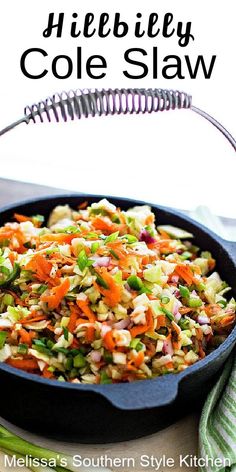 a skillet filled with coleslaw and carrots