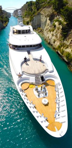 a large white boat floating on top of a body of water