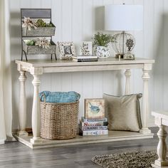 a living room with a couch, table and baskets