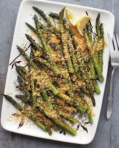 a book with an image of asparagus and lemons on the front cover