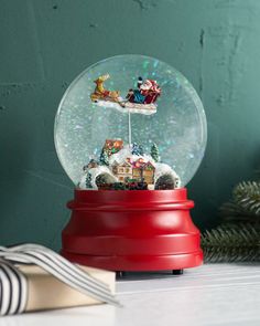 a snow globe sitting on top of a table