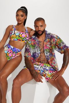 Available In Multi Color. 2 Piece Bikini Set Pair with our Nova Mens Match Back Swim Trunk For A Matching Couples Look! Bandeau Top High Waisted Cheeky Coverage Final Sale Disclaimer: Print Placement Will Vary Shell: 82% Nylon 18% Spandex Lining: 90% Polyester 10% Spandex Imported | All That Graffiti High Rise 2 Piece Bikini size 2X by Fashion Nova Husband And Wife Matching Bathing Suits, 80s Couples, 2 Piece Short Set, Matching Swimwear, Sweater Jumpsuit, Swimming Outfit, Swimming Costume, Print Placement, Bandeau Top