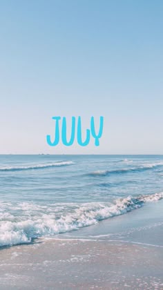 the word july is written in blue over an ocean beach scene with waves coming in