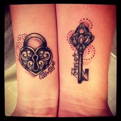 two matching tattoos with keys and hearts