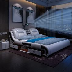 a modern bedroom with blue and white bedding in front of large window overlooking cityscape