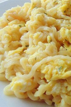 a white plate topped with macaroni and cheese