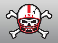 a skull and crossbones with a football helmet on it's head is shown