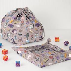 the dice bag is next to several colorful dices