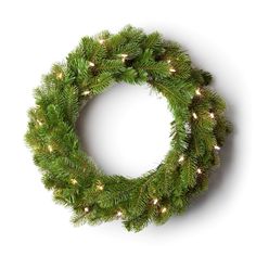 a christmas wreath with lights hanging from it