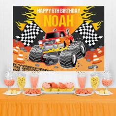 a monster truck birthday party with food and decorations