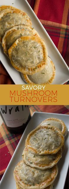 savory mushroom turnovers on a plate next to a bottle of wine