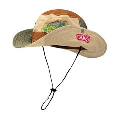 These distressed fishing hat has a vintage-inspired look, featuring a mix of colorful patches Size:• 56-58cm/ 22.0-22.8 inMaterial: Cotton Rustic Brown Sun Hat For Outdoor, Rustic Outdoor Cap, Brown Country Hat For Outdoor Activities, Country Style Brown Hat For Outdoor Activities, Casual Outdoor Hats With Patches, Casual Outdoor Hat With Patches, Casual Brown Hats For Fishing, Retro Multicolor Hats For Outdoor, Rustic Brown Hat For Outdoor