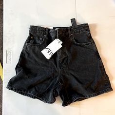 Women’s Zara 90s Bermuda Shorts New With Tag 14 Inch Waist 13 Inch Rise Black 90s Inspired High Waist Bottoms For Streetwear, 90s Inspired High-waist Bottoms For Streetwear, Black Wide Leg Jean Shorts With Pockets, 90s Short Streetwear Bottoms, 90s Style Short Length Streetwear Bottoms, 90s Short Length Streetwear Bottoms, 90s Inspired High Rise Bottoms With Pockets, Retro High-rise Shorts For Streetwear, Black Wide Leg Jean Shorts For Spring