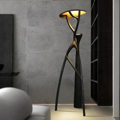 a lamp that is sitting in the middle of a room