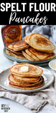 pancakes on plates with butter and syrup in the background text reads, how to make speltt flour pancakes