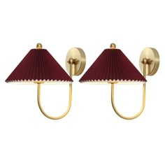 two wall lights with red shades on the sides and gold metal fittings, one light is