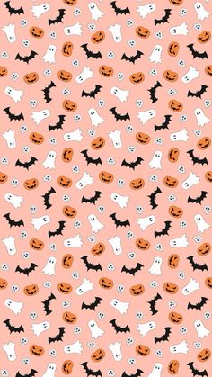 an orange and black background with lots of white dogs on it's faces, bats and pumpkins