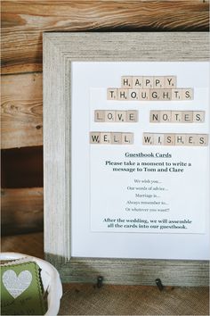 a wooden scrabble frame with the words happy, thought, love notes and well wishes