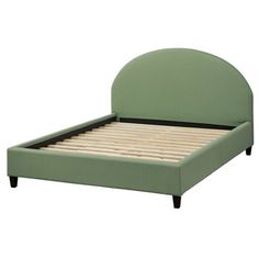 a green bed frame with wooden slats