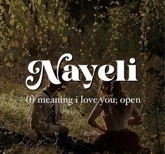 a man and woman are sitting in the grass with text reading naveli meaning i love you, open