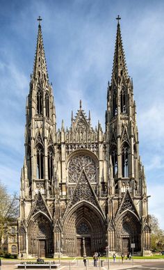 the large cathedral has many spires on it's sides and is very ornate