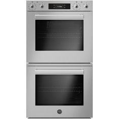 two stainless steel ovens side by side