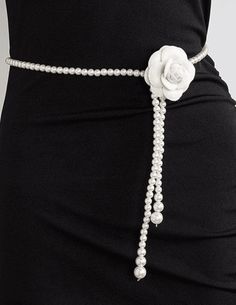 Fleur de Camélia Pearl Camellia Waist Belt in Pearl. 41.5" costume pearl strand. Silver tone claw clasp closure. Completely adjustable. Can be worn as necklace or belt. Removable white felt camellia pin. Camelia 3" diameter. Resort Accessories, Pearl Belt, Rococo Sand, Minnie Rose, Pearl Strand, Ronny Kobo, Ribbon Belt, Kids Denim, Pearl Strands