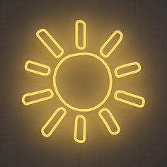 a yellow neon sign that is on the side of a wall with an image of a sun