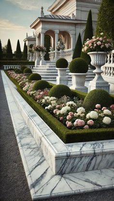 an elaborate garden with white and pink flowers