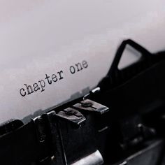 an old fashioned typewriter with the words,'charter one'written on it