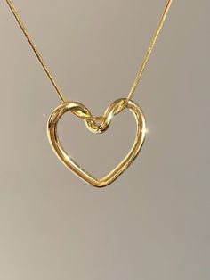 "HEART NECKLACE WITH SNAKE CHAIN Material: High Quality Solid 925 Sterling Silver Color options: Silver, Gold, Rose Gold Necklace length: 16 Inches (40 cm) All pieces will come with a 2\" extension chain so you can fine tune the fit. ♡ The most unique jewelry you can find, perfect gift for you and your loved one. ♡ All of our jewelry is handcrafted with enthusiasm and great care in our workshop. ► HOW TO CARE FOR YOUR JEWELRY * Maintain your jewelry's high shine by avoiding contact with any chemicals such as soap, perfume, lotion, makeup, hair & cleaning products. * Keeping your jewelry in a pouch or a box after using it will prolong the life of your jewelry. * Not recommended for sensitive and allergic skin. * You can do your product maintenance with a cotton-soft dry cloth. * You can kee Silver Unique Jewelry, Heart-shaped Gold Chain Necklace, Gold Heart-shaped Necklace For Gift, Luxury Gold Heart Necklace, Elegant Style, Gold-tone Heart Pendant Jewelry For Gift, Cute Pendant Necklace, Gold Heart Jewelry, Heart Shape Jewelry, خواتم خطوبة