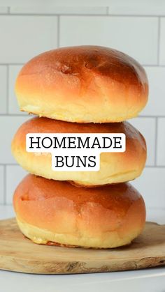 three bagels stacked on top of each other with the words homemade buns above them