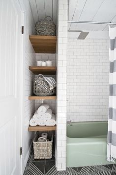 the bathroom is clean and ready to be used as a bathtub or shower stall