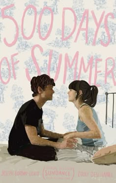 a man and woman sitting on the ground next to each other in front of a sign that says 500 days of summer