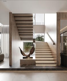 there is a modern staircase in the house