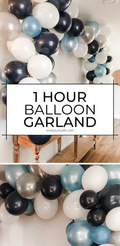 balloons are arranged in the shape of a garland with black, white and blue colors