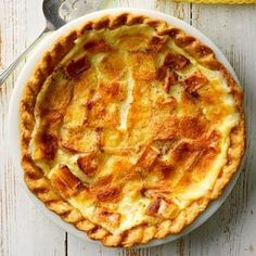 a pie sitting on top of a white table