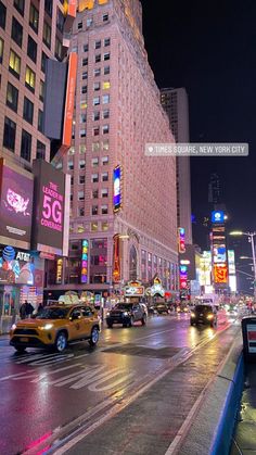 a city street filled with lots of traffic at night